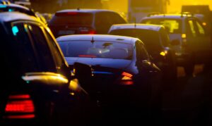 Urban traffic jam at the evening, sunlight