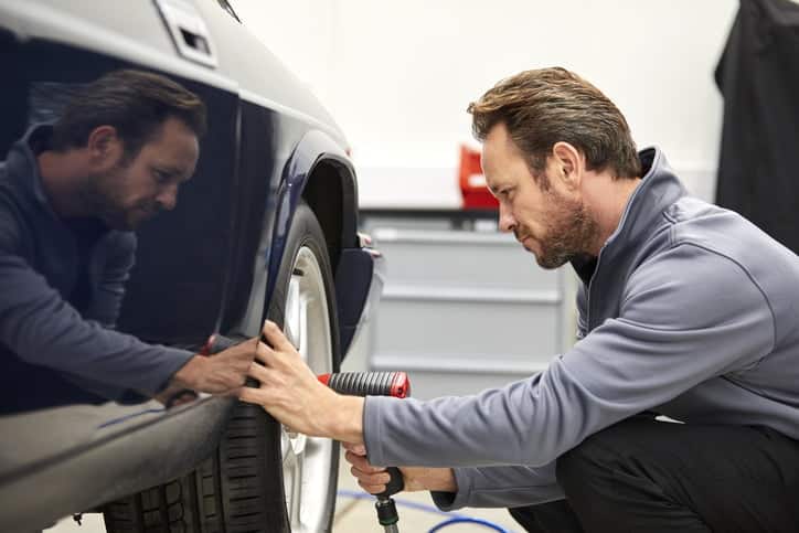 fitting wheel on classic car
