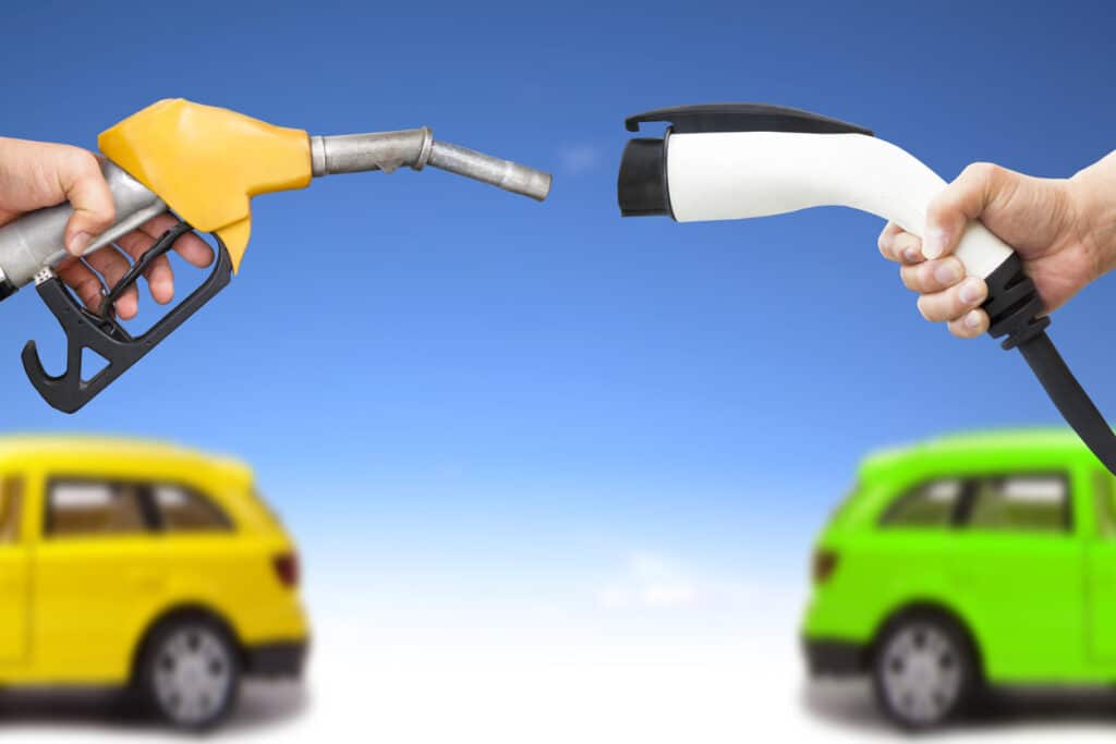 electric charger vs gasoline car pump.